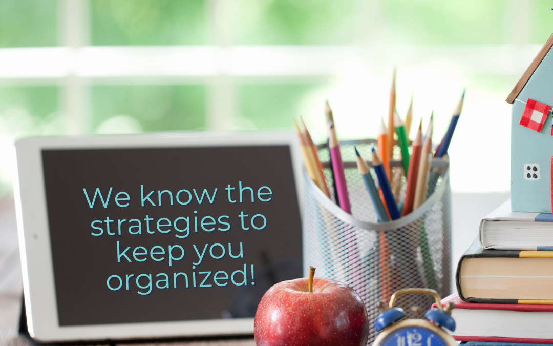 Back to school desk with clock and digital display saying We know the strategies to keep you organized